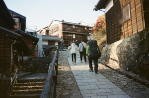 Folks climbing up the hill in Magome