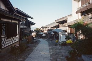 Another photo of Magome, with a winding street and small houses clustered along it